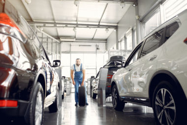 handsome-man-blue-uniform-checks-car.jpg  